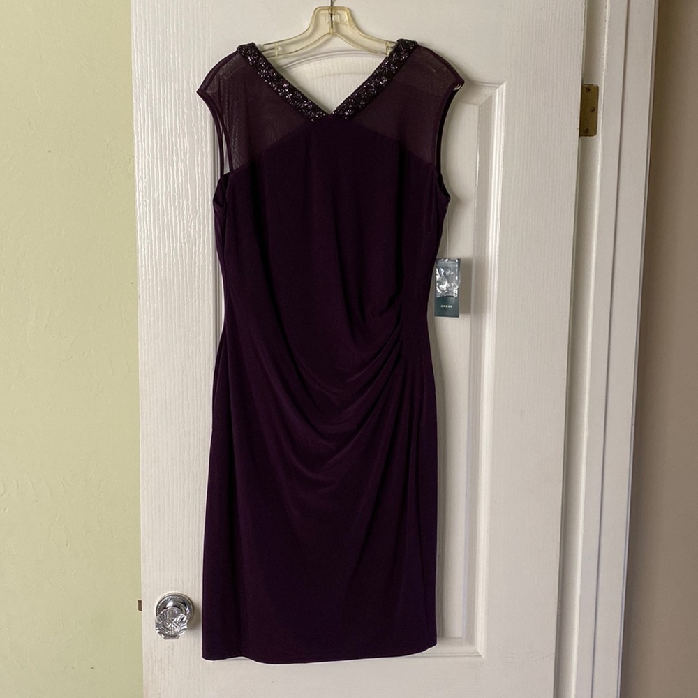 Brand new with tags purple body con dress.